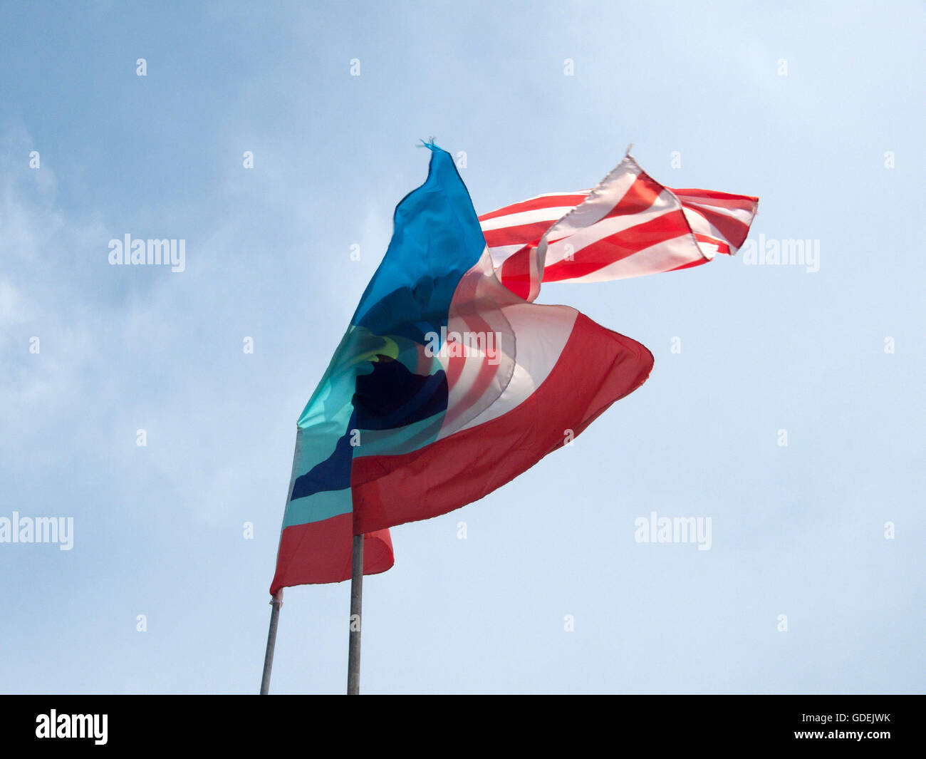 Flags of Malaysia and the state of Sabah blowing in wind Stock Photo