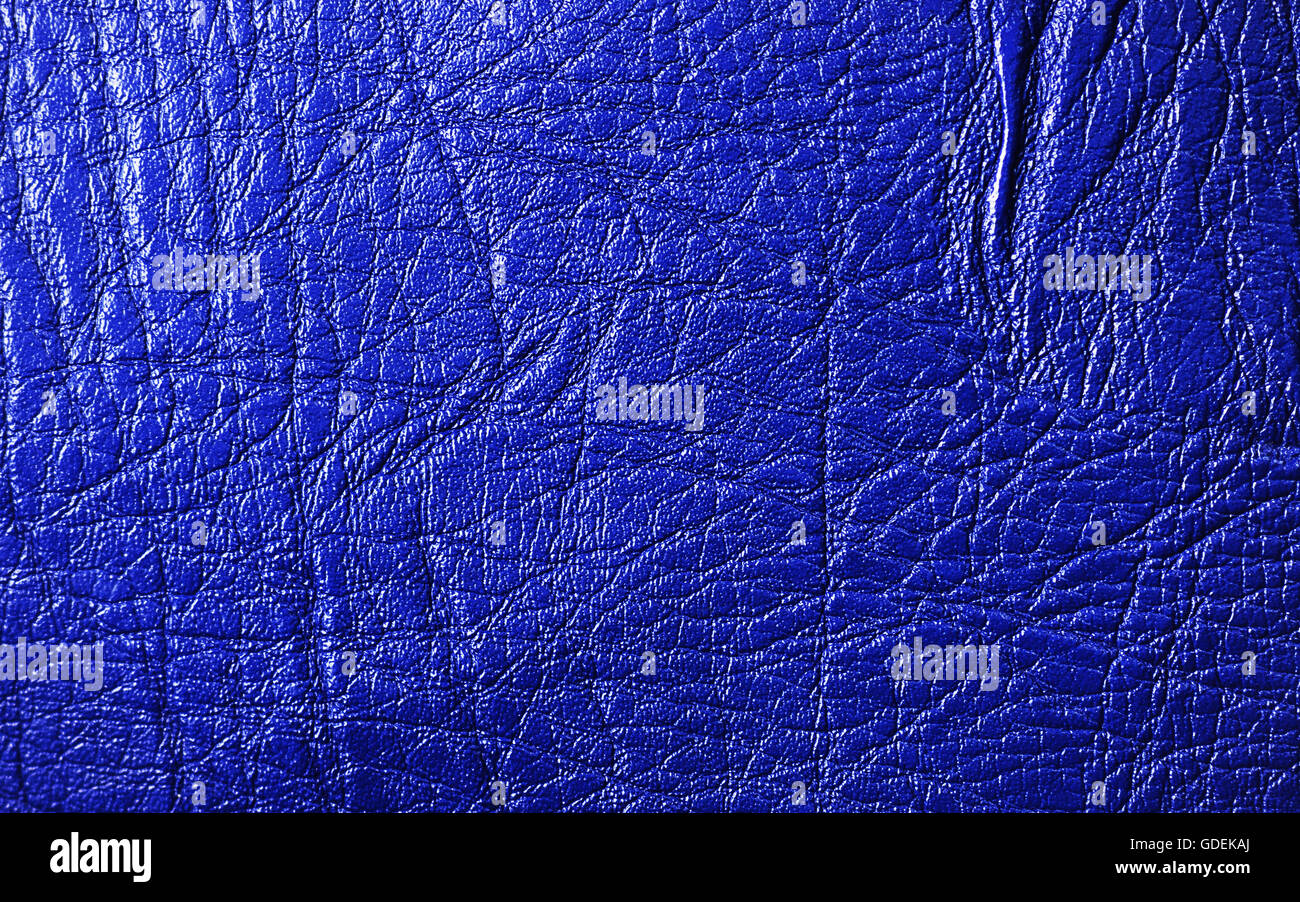 Blue vivid leather texture closeup, useful as background Stock Photo