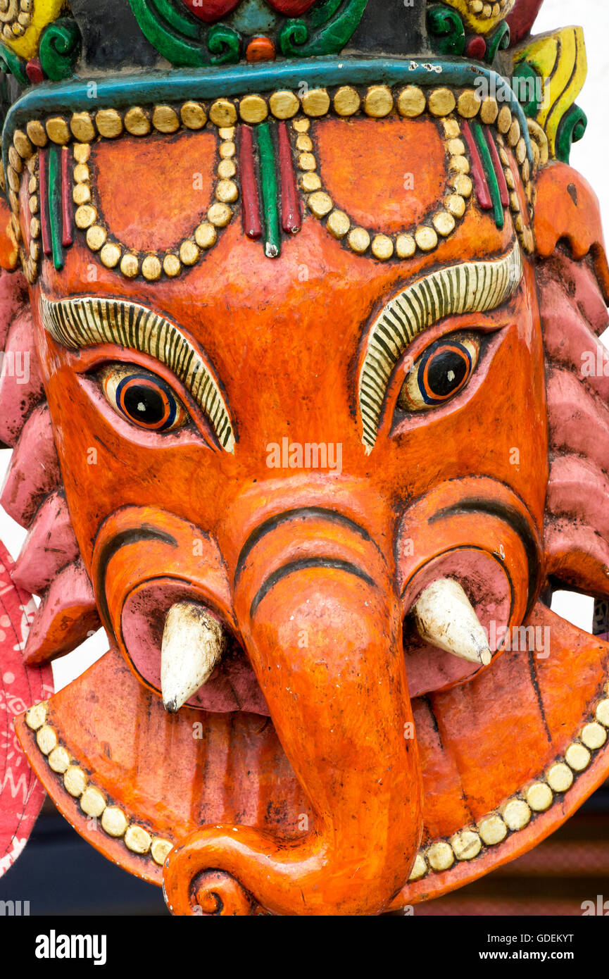 Lord Ganesha face wood carving Stock Photo