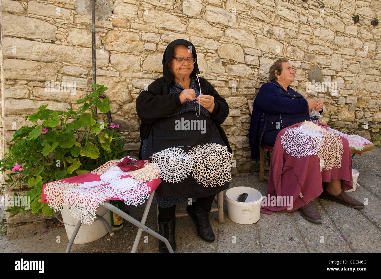 Crocheting woman in Omodos,  Troodos Mountains, Republic of Cyprus Stock Photo