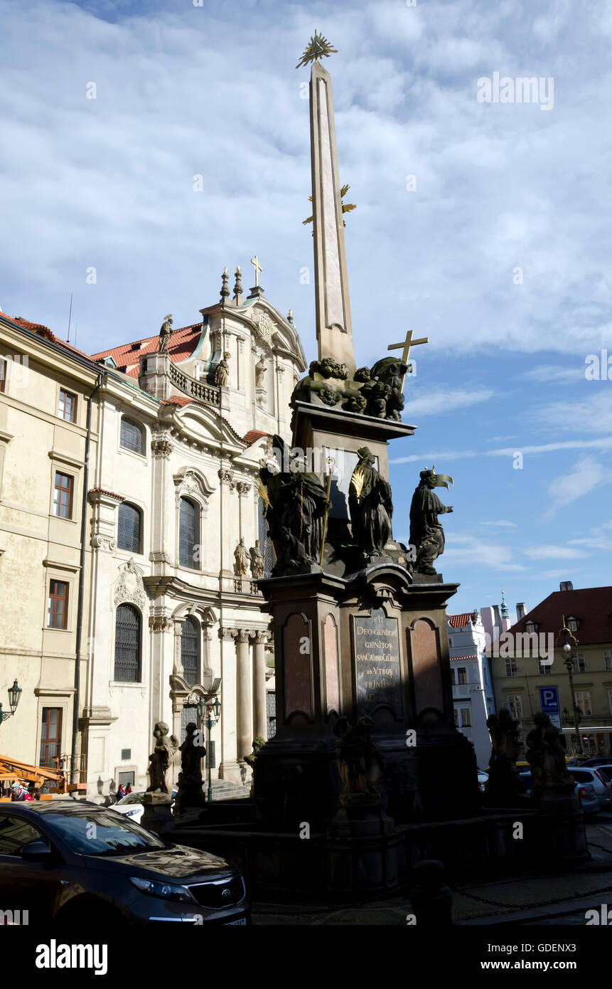 Monument outside the Church of St Nicholas (Kostel Sv. Mikulase) in the centre of Prague (Praha) in the Czech Republic. Stock Photo