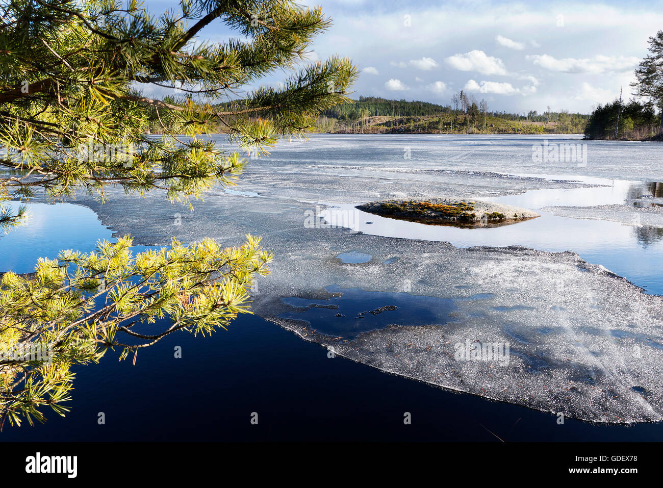 Unfreezing lake, near Fillipstaad, Sweden Stock Photo