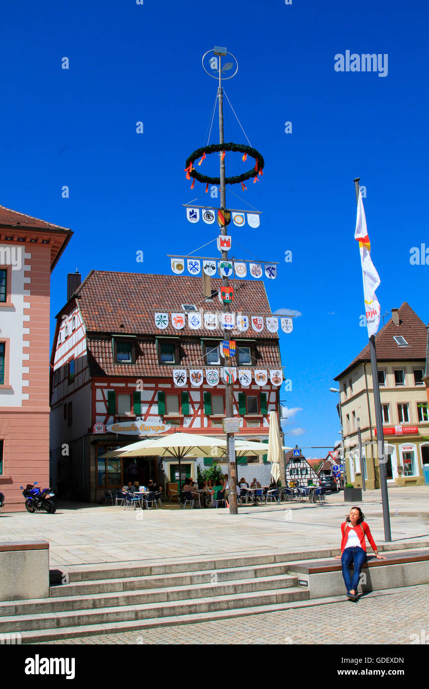 Frame house and may tree in the oldtown, Eppingen, Baden Wuerttemberg, Germany / may pole Stock Photo