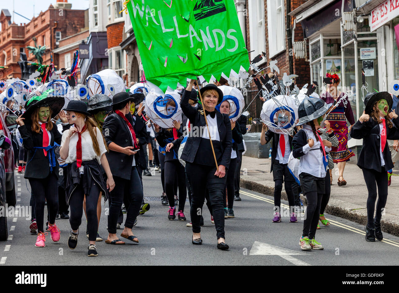Local Children In Parade Through The Streets Of Lewes During The Annual Schools 'Moving On' Parade, High Street, Lewes, UK Stock Photo