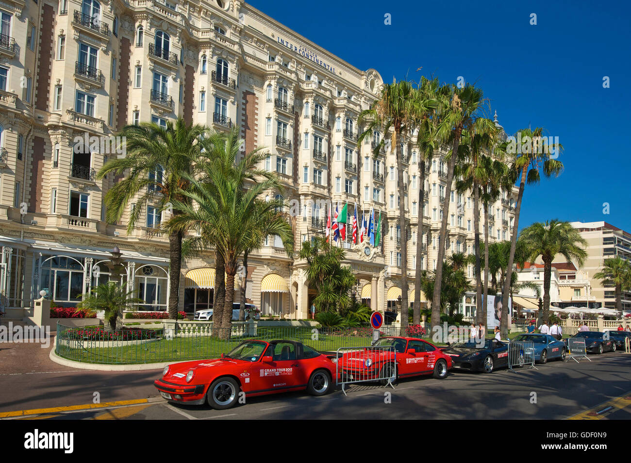 Porsche on front of Hotel Carlton, Croisette in Cannes, Cote d'Azur, France Stock Photo