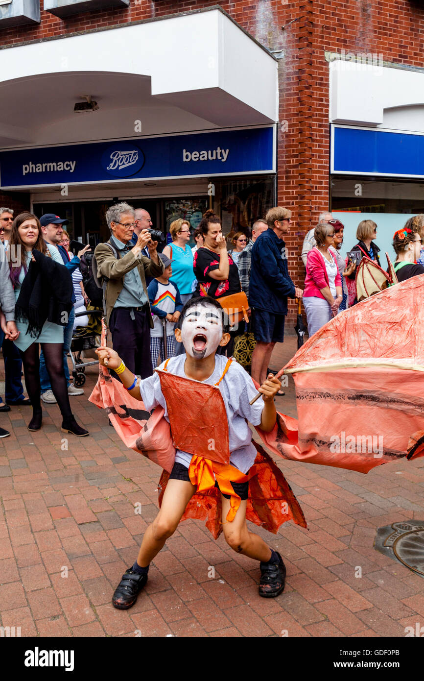 Local Schoolchildren Take Part In The Annual 'Moving On' Parade Through ...