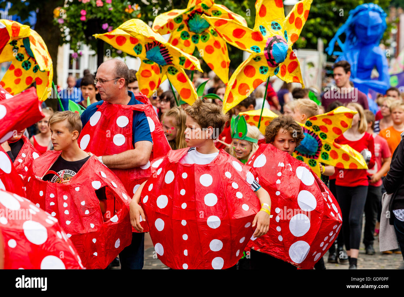 Local Schoolchildren Take Part In The Annual 'Moving On' Parade Through ...