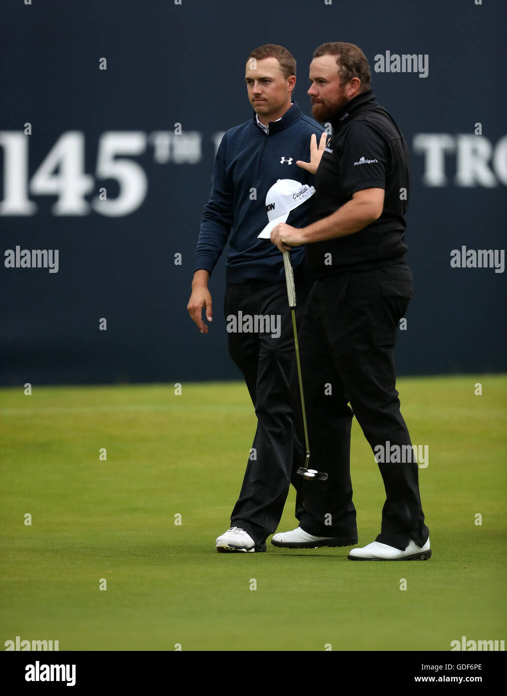 USA's Jordan Spieth (left) and Ireland's Shane Lowry after their round during day two of The Open Championship 2016 at Royal Troon Golf Club, South Ayrshire. Stock Photo