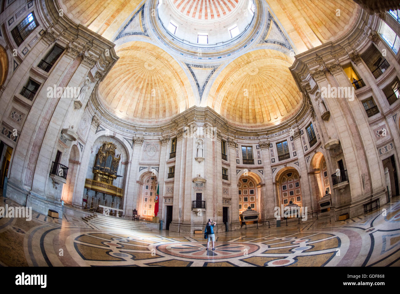 LISBON, Portugal - Portugal's National Pantheon is the burial place of luminaries from Portuguese society and history, including several presidents of Portugal, fado singer Amália Rodrigues, footballer Eusébio, and the writer João de Deus. The main hall also includes several cenotaphs to key figures that are buried elsewhere but have played important roles in Portuguese history, such as Henry the Navigator and Vasco da Gama. The Pantheon is housed in a building that was originally the Church of Santa Engrácia--it was converted in the 1960s. Stock Photo