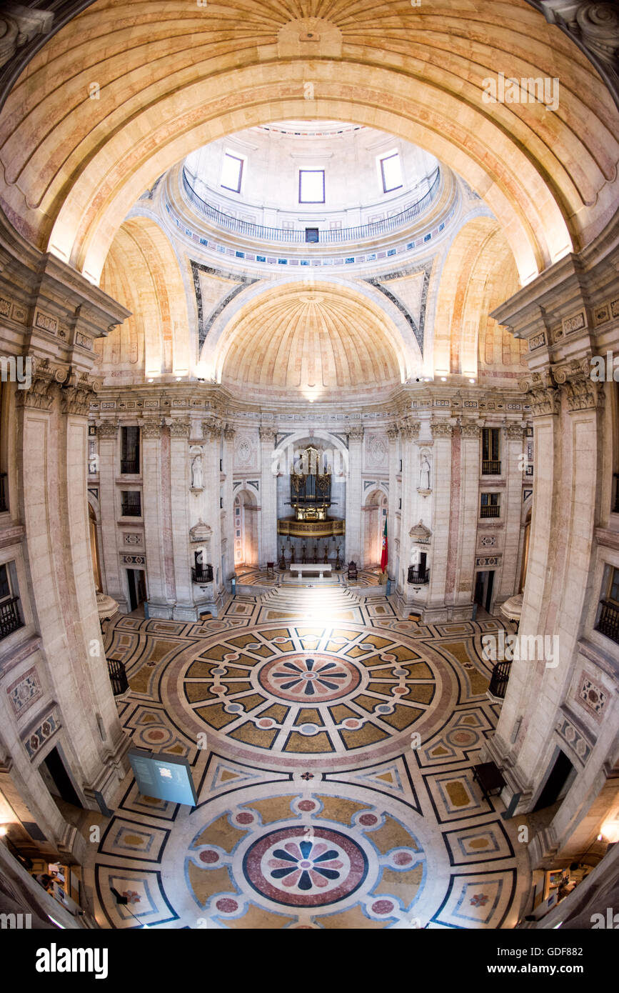 LISBON, Portugal - Portugal's National Pantheon is the burial place of luminaries from Portuguese society and history, including several presidents of Portugal, fado singer Amália Rodrigues, footballer Eusébio, and the writer João de Deus. The main hall also includes several cenotaphs to key figures that are buried elsewhere but have played important roles in Portuguese history, such as Henry the Navigator and Vasco da Gama. The Pantheon is housed in a building that was originally the Church of Santa Engrácia--it was converted in the 1960s. Stock Photo