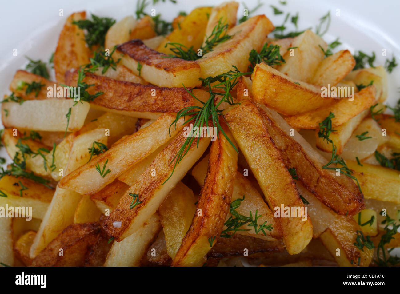 Roasted potato with dill and parsley Stock Photo Alamy
