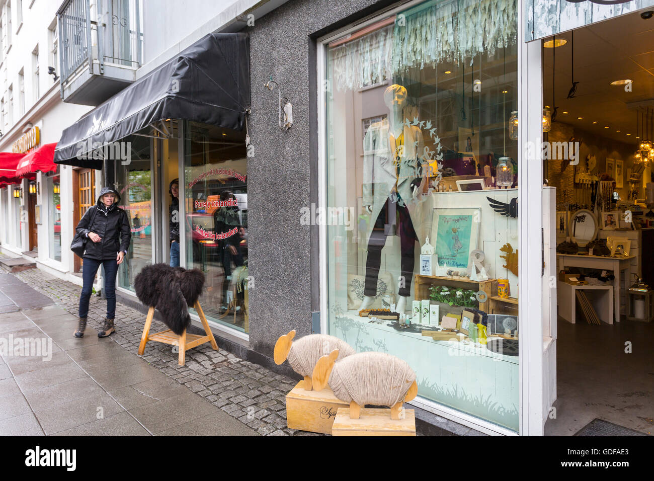 shopping in the rain, Frakkastigur Street, Reykjavik, Iceland Stock Photo