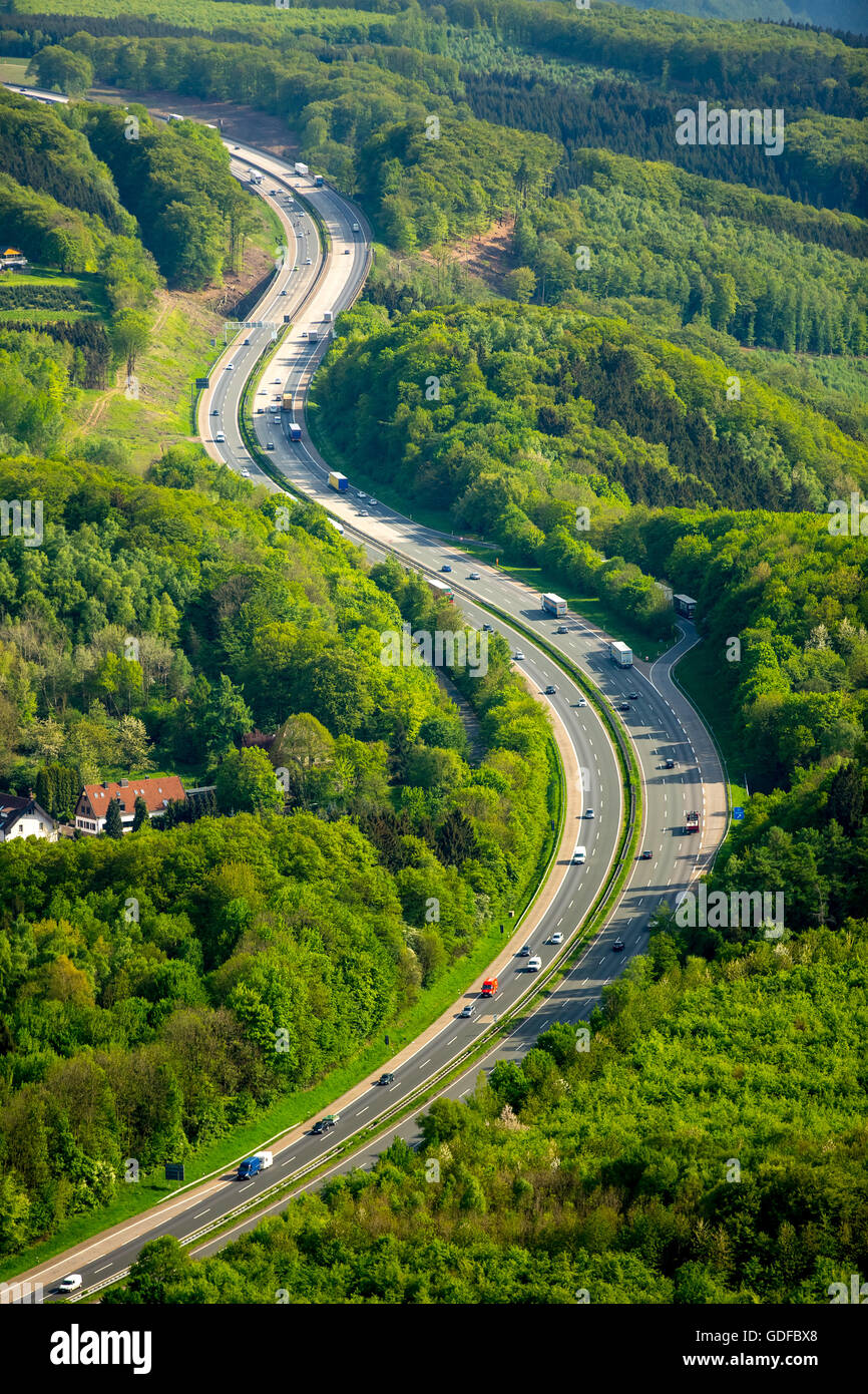 Aerial view, Autobahn A45, Sauerlandlinie, curvy highway through a wooded area, Hagen, North Rhine-Westphalia, Germany Stock Photo