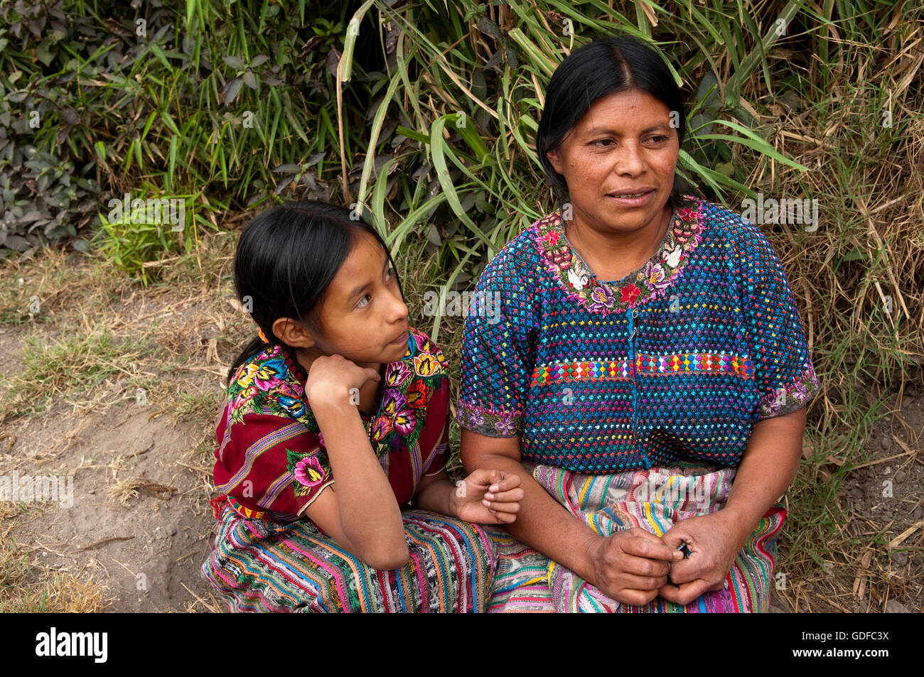 Girl and woman, San Lucas Toliman, Lago de Atitlan, Guatemala, Central America Stock Photo