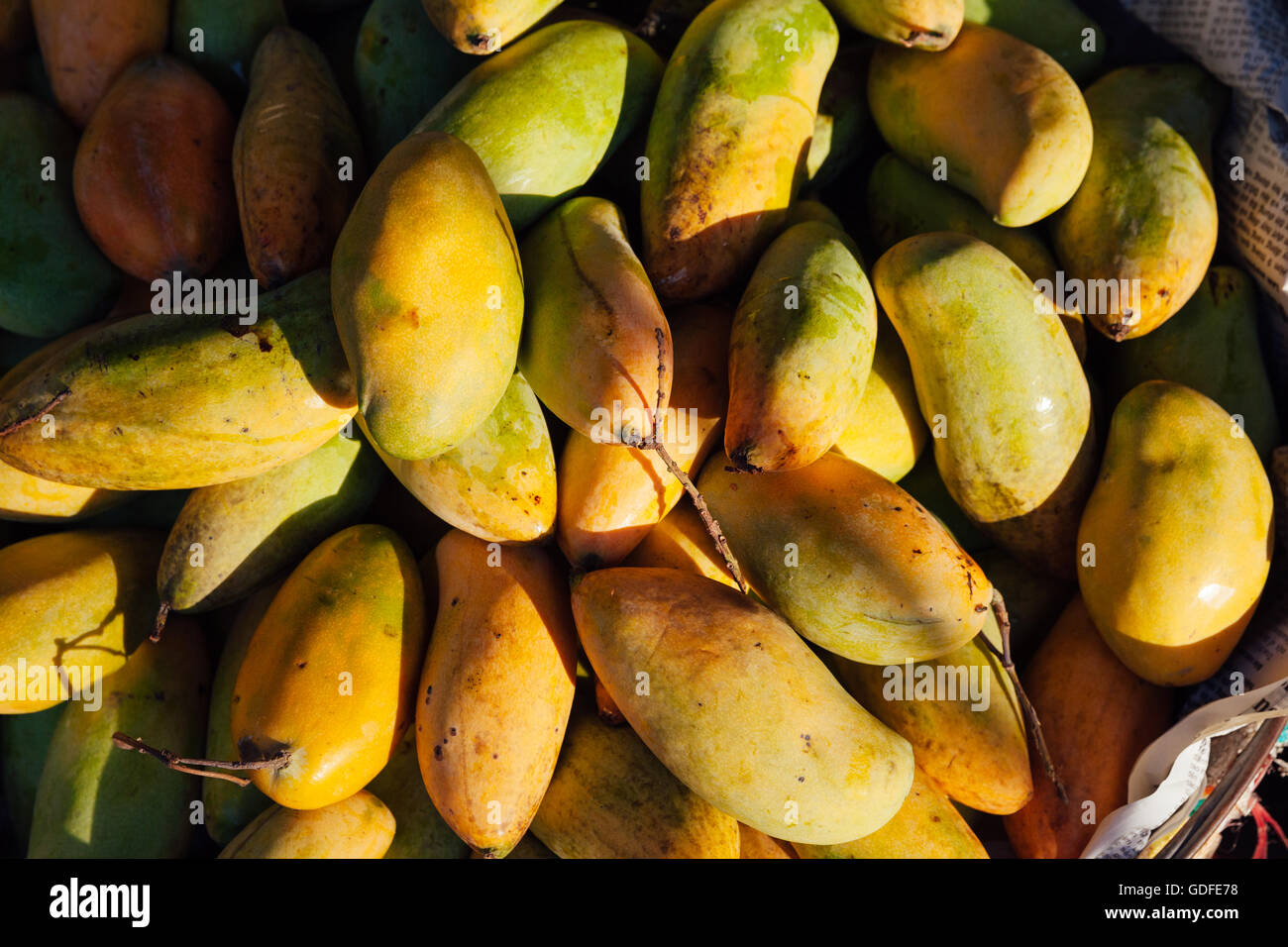 Basket with mangoes at the street market, Vietnam Stock Photo Alamy