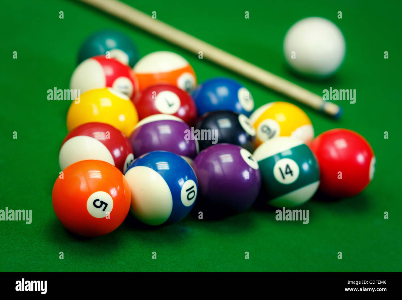 Billiard balls in a green pool table Stock Photo - Alamy