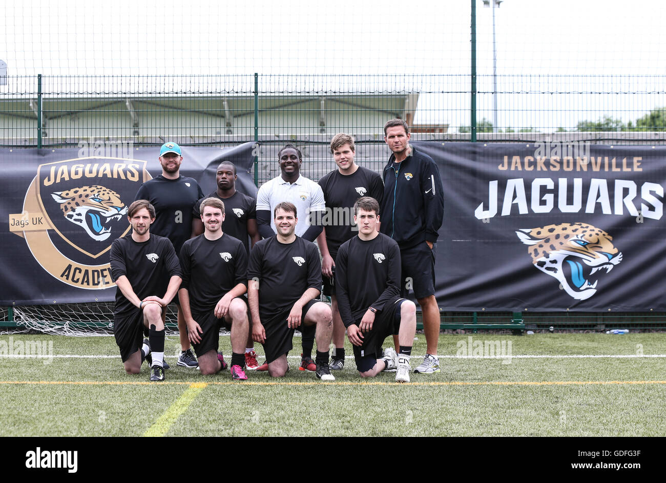 Jacksonville Jaguars assistant defensive line coach Aaron Whitecotton (top row, left) Denard Robinson (top row, centre) and Tony Boselli (top row, right) pose for a photo with students during the Jacksonville Jaguars academy day at Loughborough University. PRESS ASSOCIATION Photo. Picture date: Friday July 15, 2016. Photo credit should read: Barry Coombs/PA Wire Stock Photo