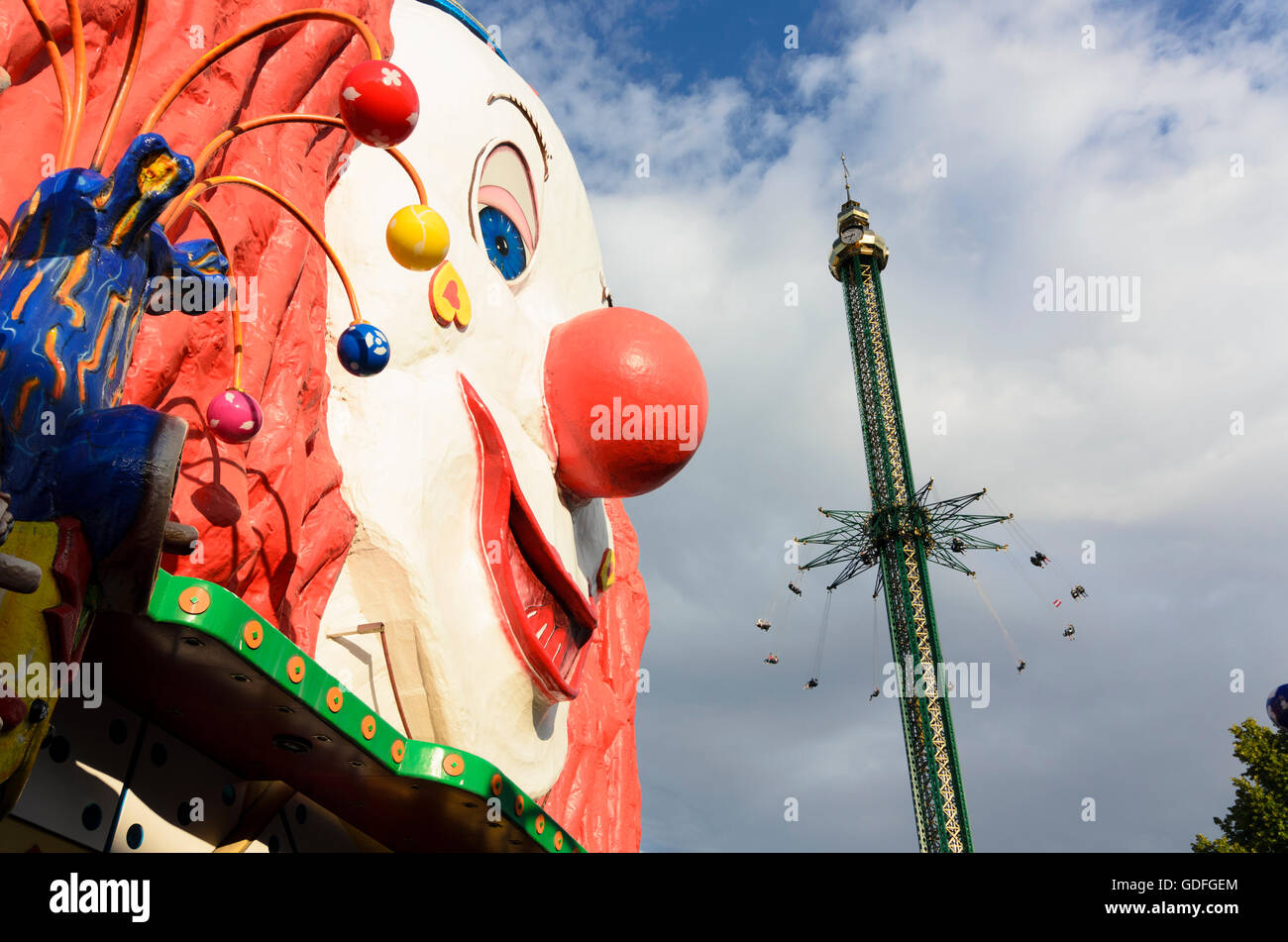 Wien, Vienna: Carousel Praterturm and head of a clown in the Prater ...