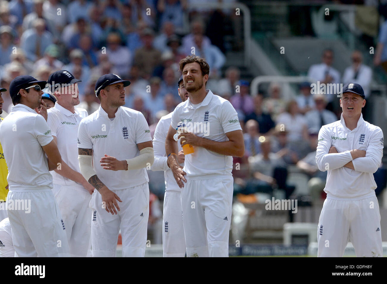 England's Steven Finn (centre) reacts after losing a DRS review following an appeal for the wicket of Pakistan's Asad Shafiq (not pictured) during day three of the Investec Test match at Lord's, London. Stock Photo