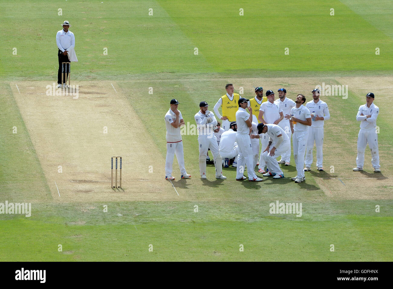 England's Steven Finn (third right) reacts after losing a DRS review following an appeal for the wicket of Pakistan's Asad Shafiq (not pictured) during day three of the Investec Test match at Lord's, London. Stock Photo