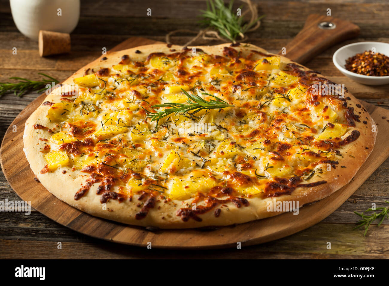 Homemade Potato Rosemary Pizza with Mozzarella Cheese Stock Photo