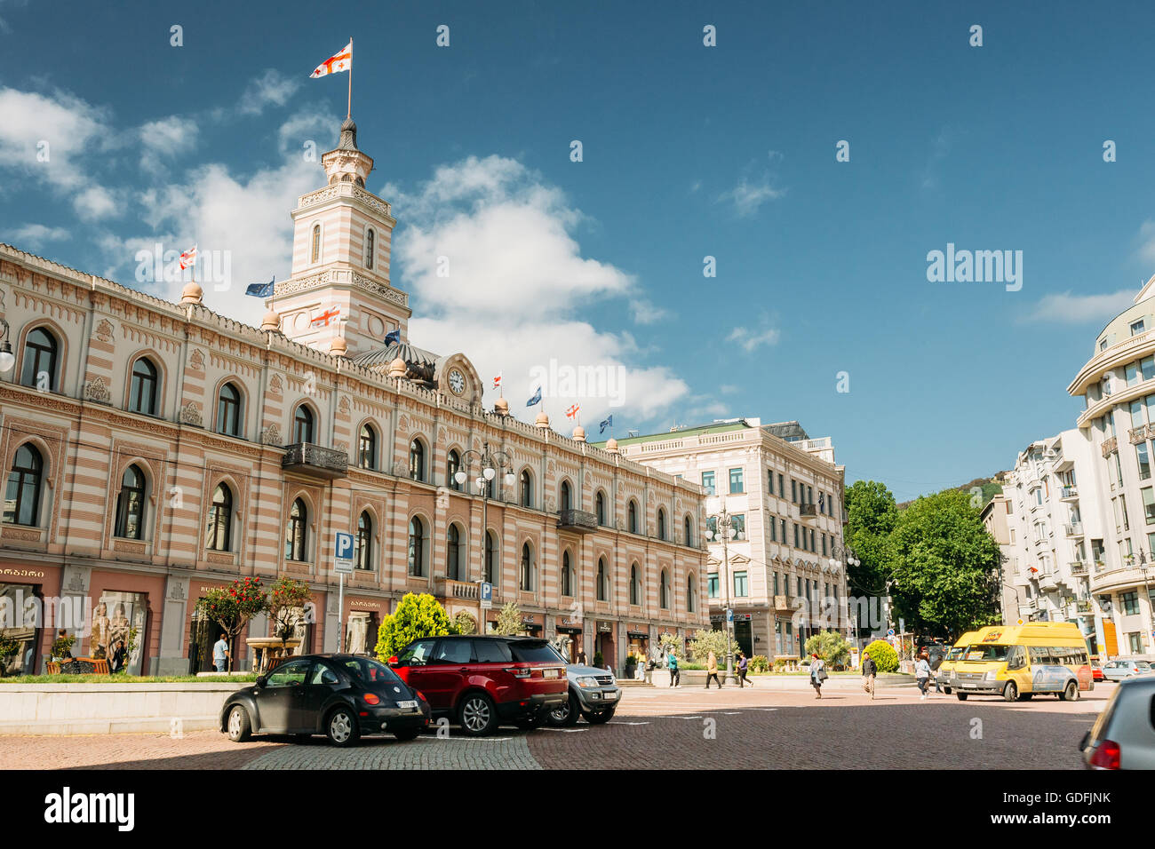 Tbilisi, Georgia - May 19, 2016: Tbilisi City Hall is a clock-towered edifice situated in the southern side of Freedom Square, T Stock Photo