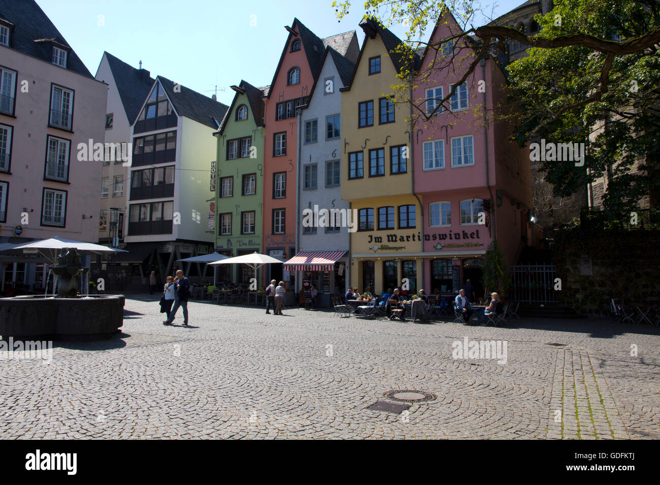 Situated on the banks on the Rhine in a section of Cologne known as Martinsviertel, the Old Fish Market, with Gothic townhouses. Stock Photo