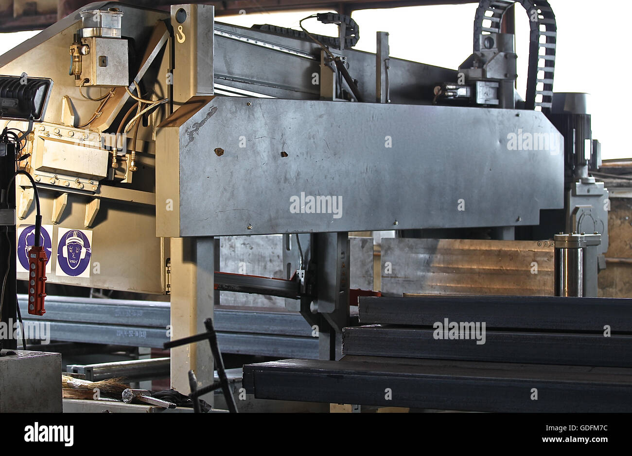 powerful industrial band saw for cutting of long rolled metal Stock