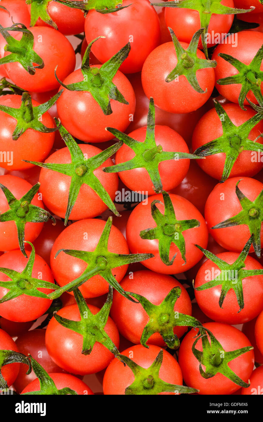 food background of fresh red cherry tomatoes Stock Photo - Alamy