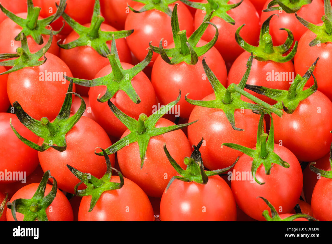 food background of fresh red cherry tomatoes Stock Photo - Alamy