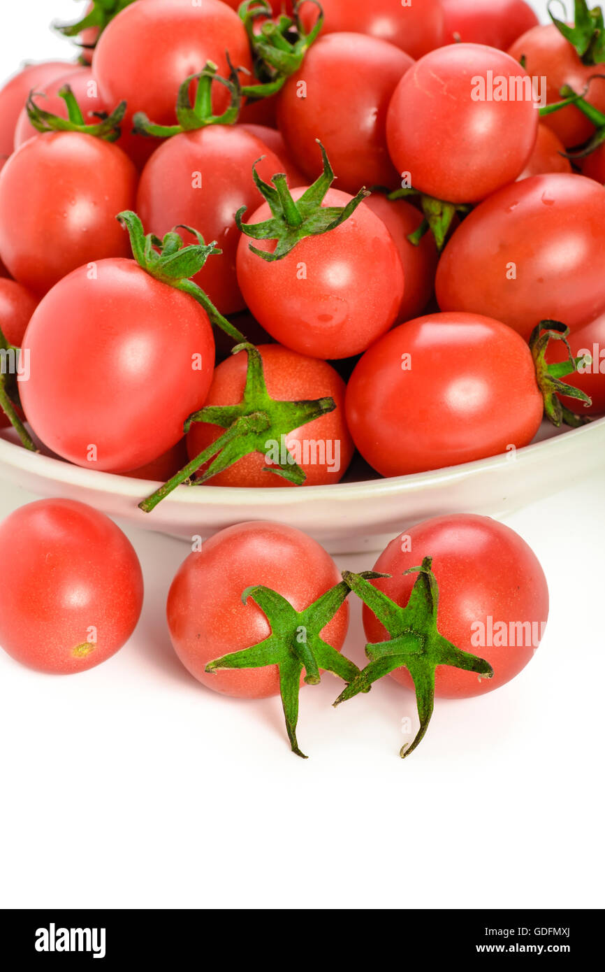 fresh red cherry tomatoes isolated on white background Stock Photo - Alamy