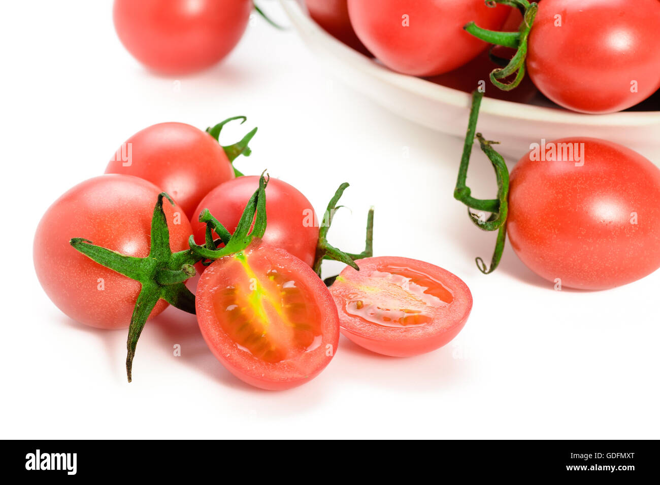 fresh red cherry tomatoes isolated on white background Stock Photo - Alamy