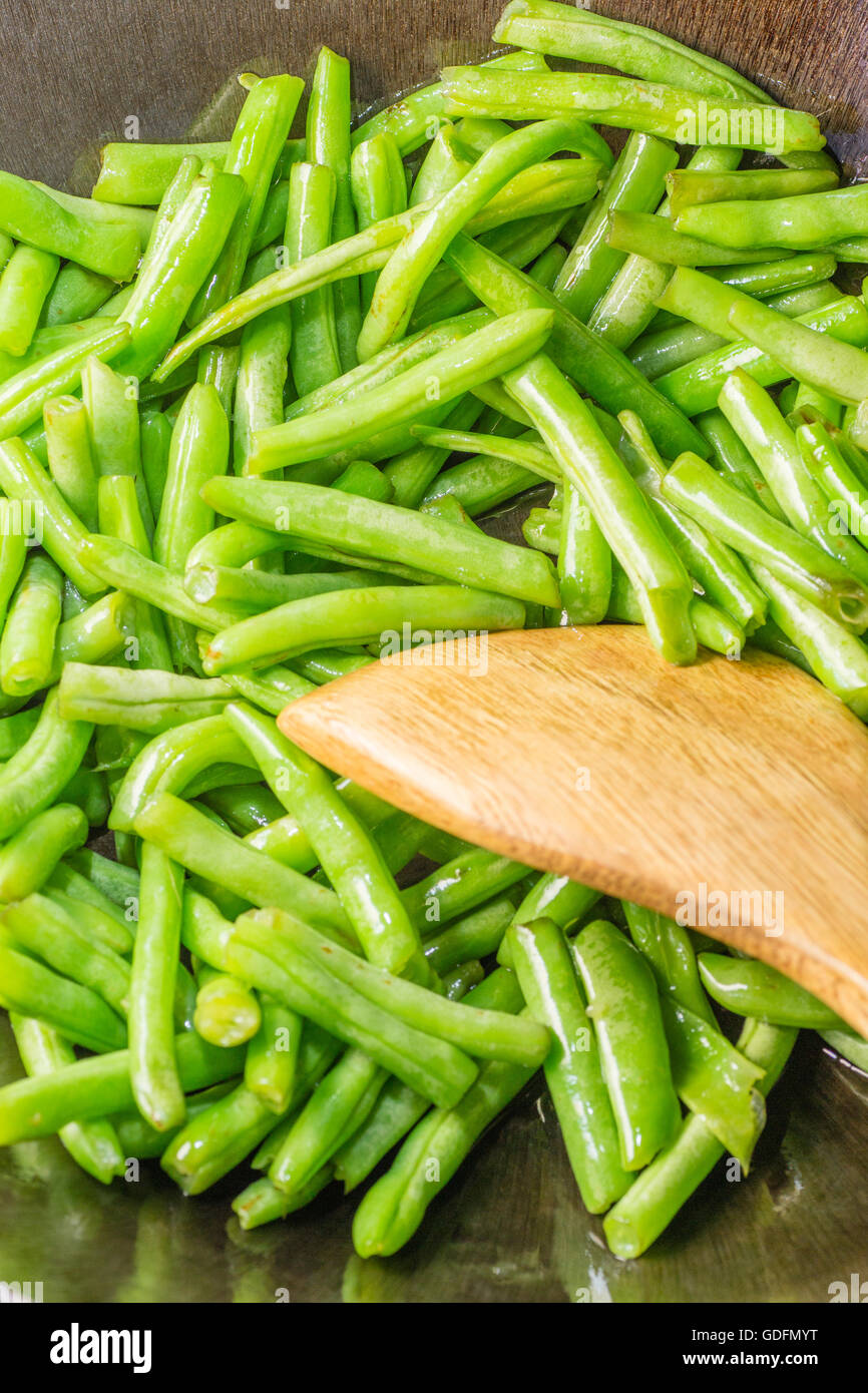 Veg with wooden spoon in pot hi-res stock photography and images - Alamy