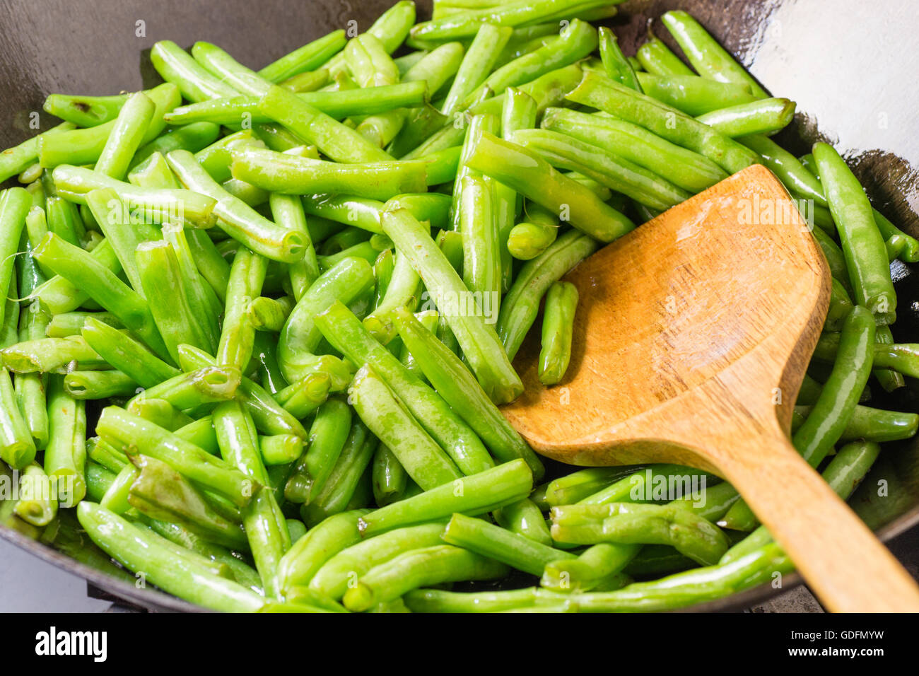 Veg with wooden spoon in pot hi-res stock photography and images - Alamy