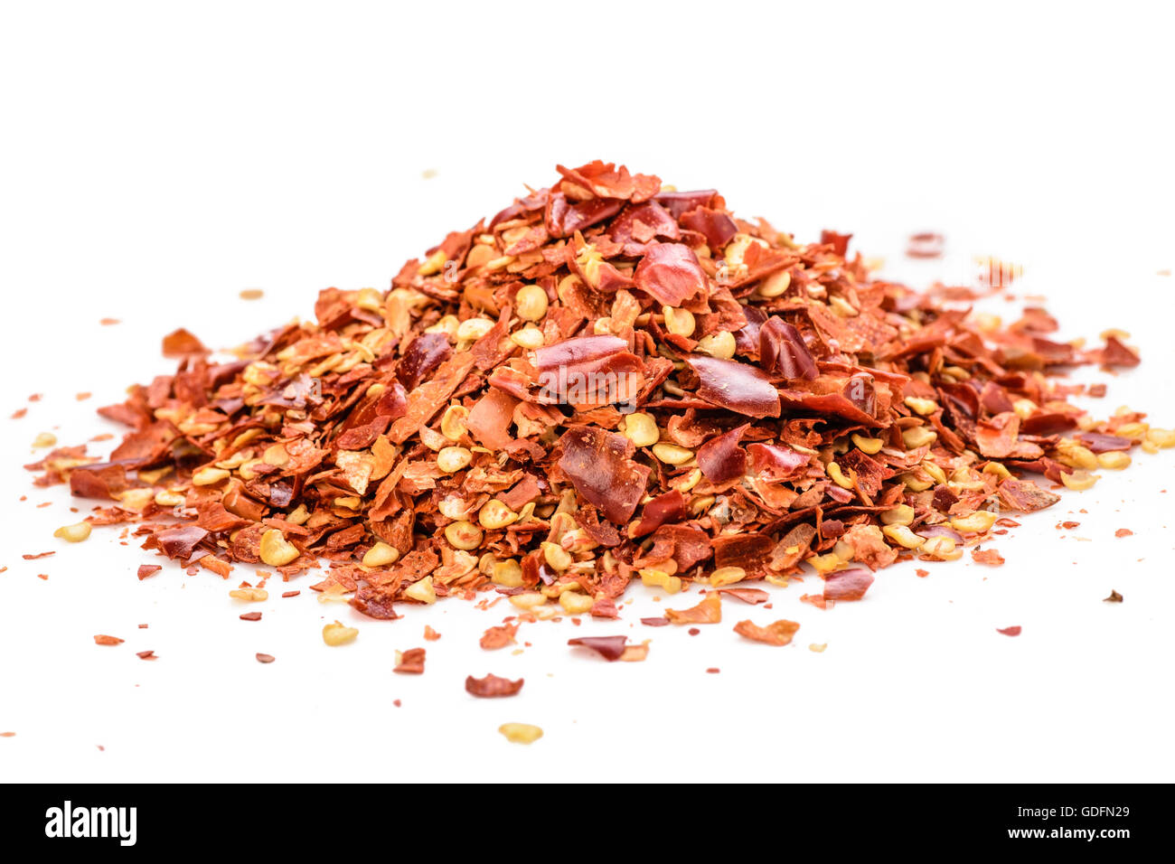 red chilli flakes on the white background Stock Photo Alamy