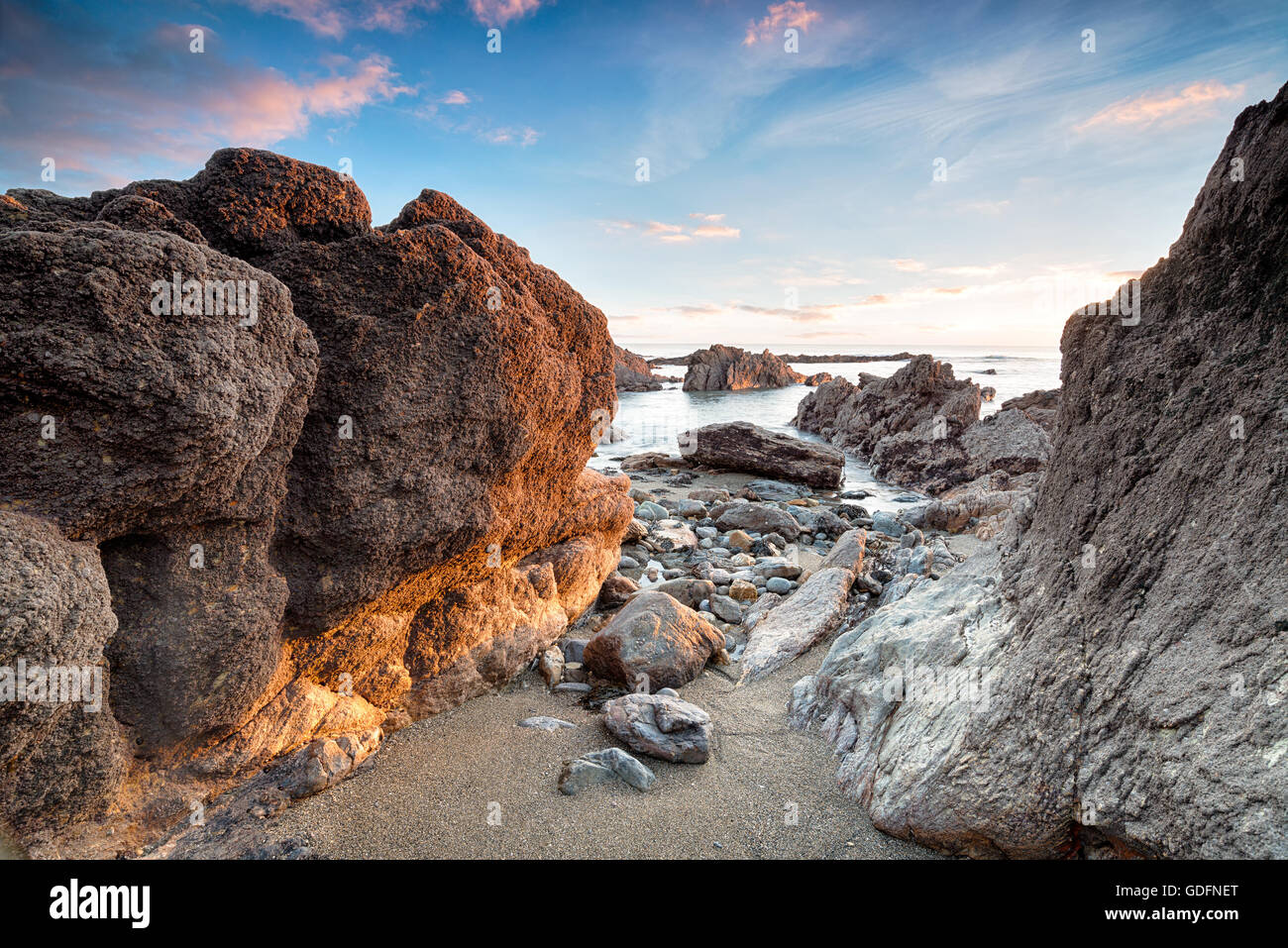 The rocky beach at Hemmick on the south coast of Cornwall Stock Photo