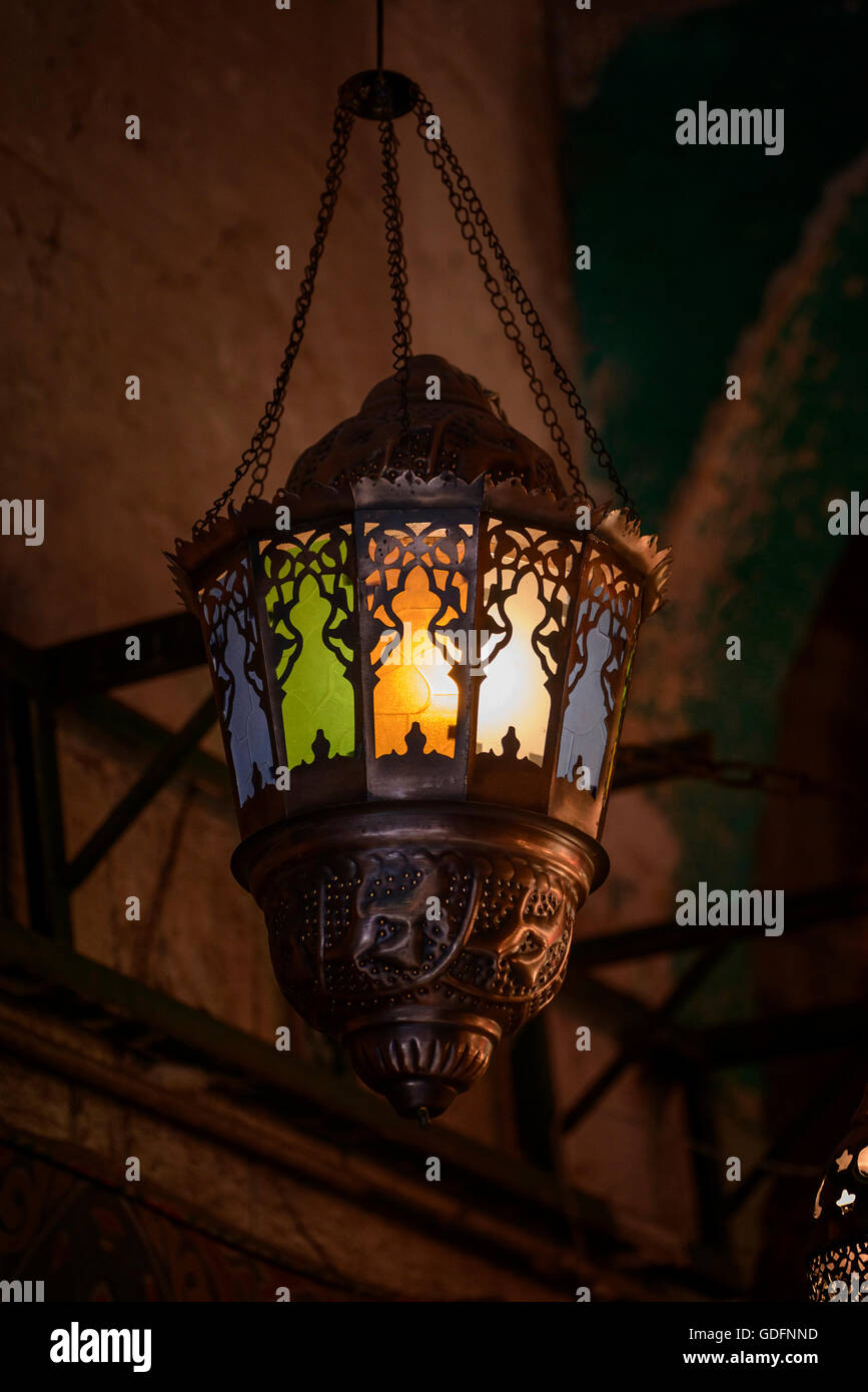 Dangling Decorative Ramadan Festive Lantern Glowing in Dark Stock Photo