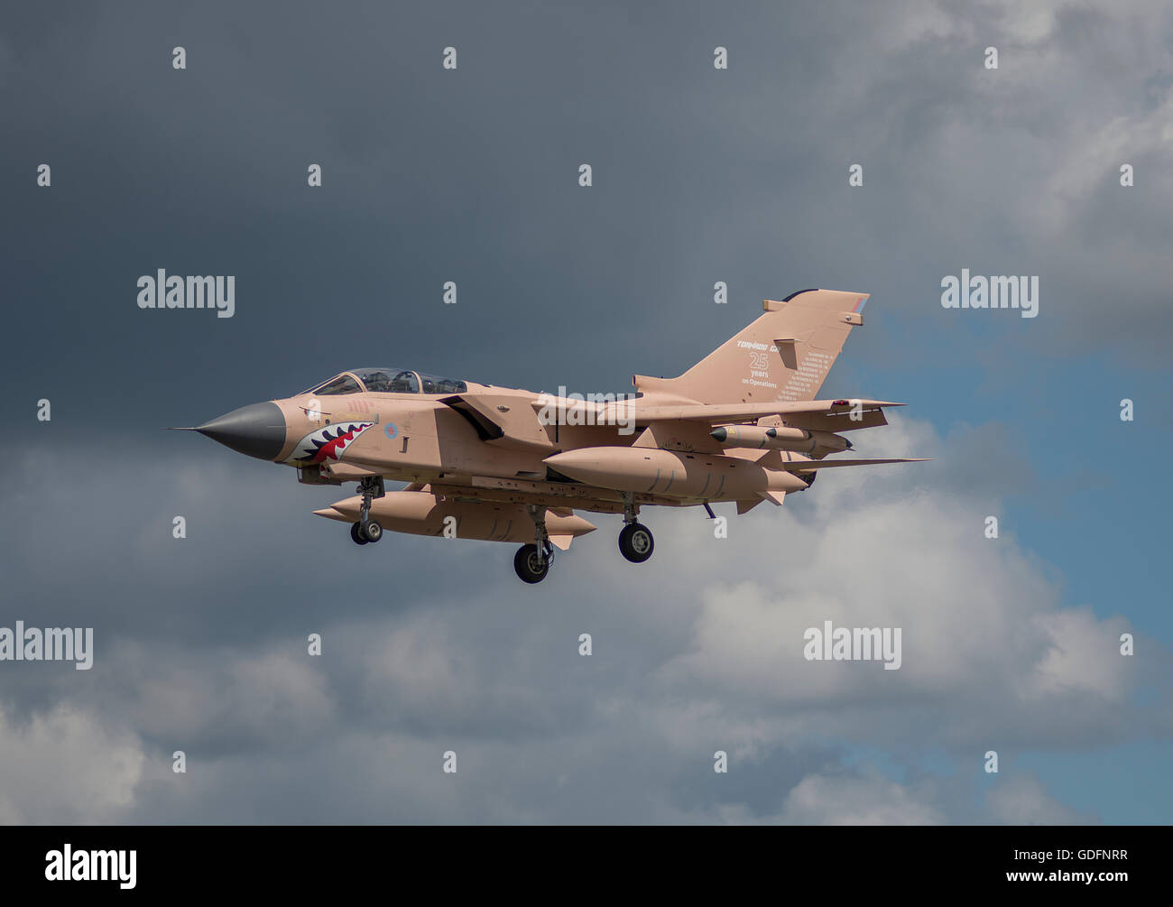 The 2016 Farnborough International Trade Airshow, a Panavia Tornado GR4 of the RAF arrives painted in Gulf War camouflage. Stock Photo