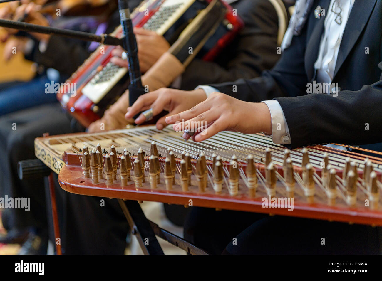 Two Hands Playing Arabian Qanon Musical Instrument Stock Photo