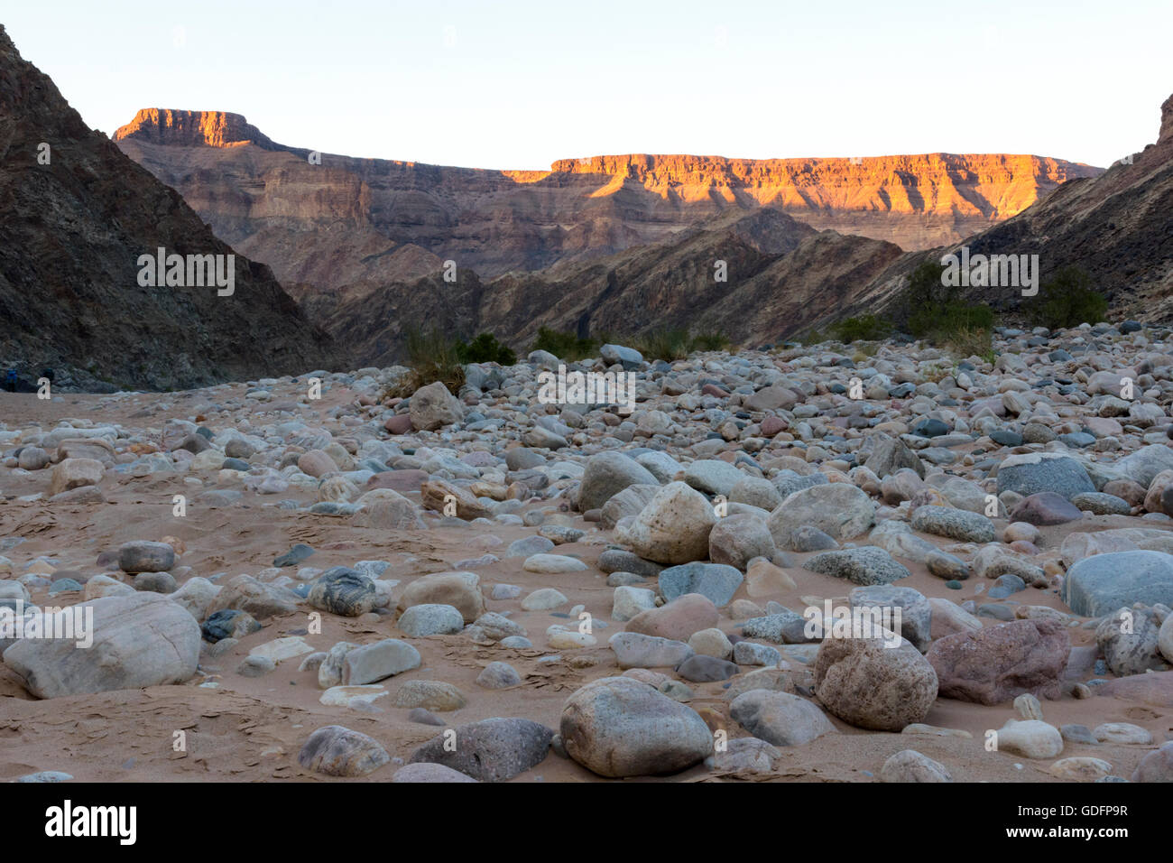 Rocks in the dry river bed of the Fish River along the Fish River Canyon hiking trail in southern Namibia Stock Photo