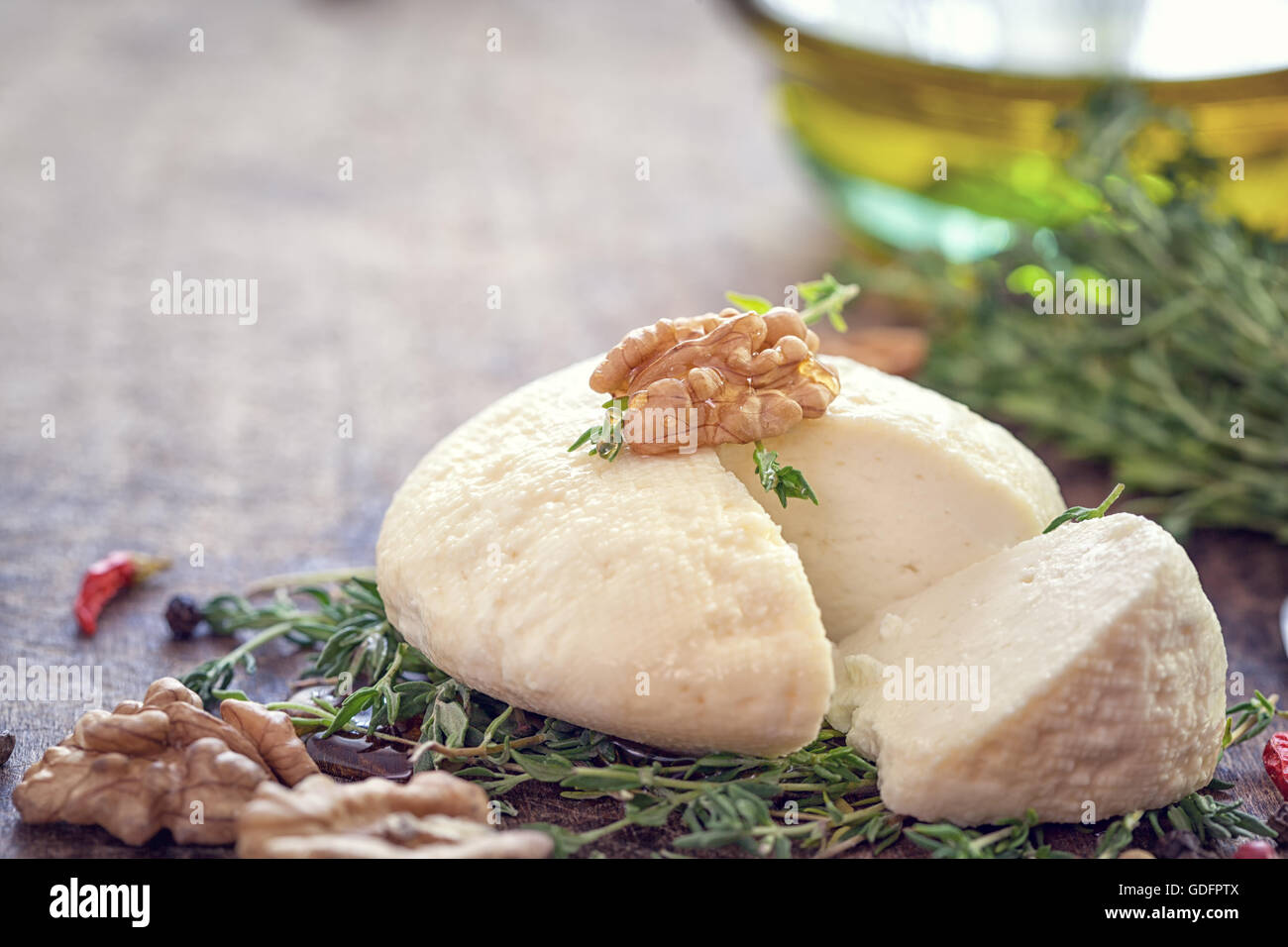Goat cheese with honey, thyme and nuts Stock Photo Alamy