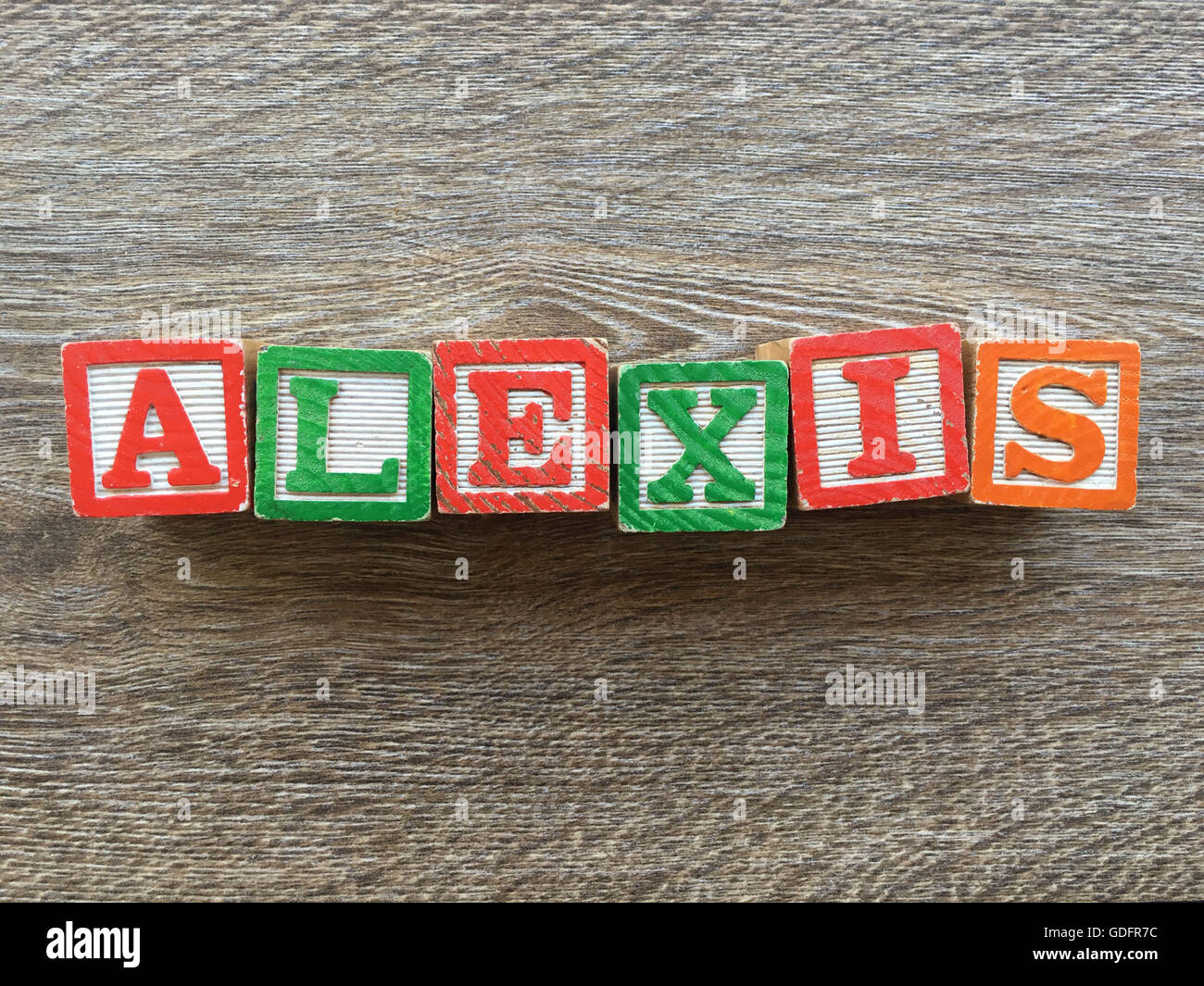 Alexis name written with wood block letter toys Stock Photo Alamy