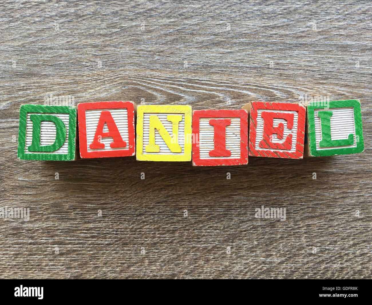 Daniel name written with wood block letter toys Stock Photo Alamy