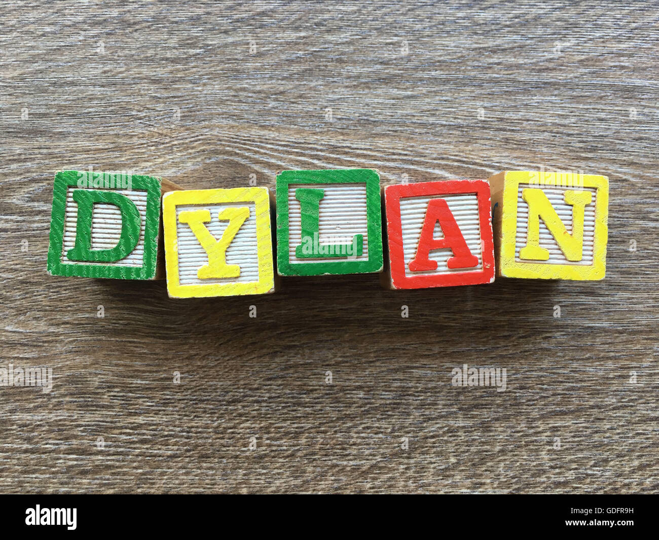 Dylan name written with wood block letter toys Stock Photo - Alamy