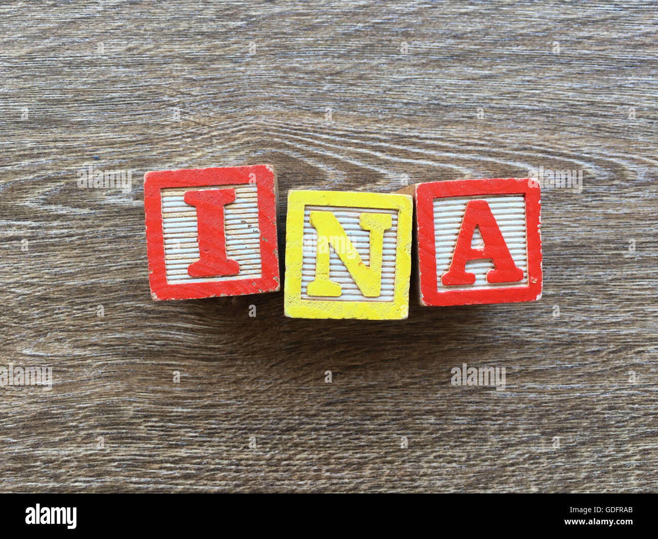 Ina name written with wood block letter toys Stock Photo
