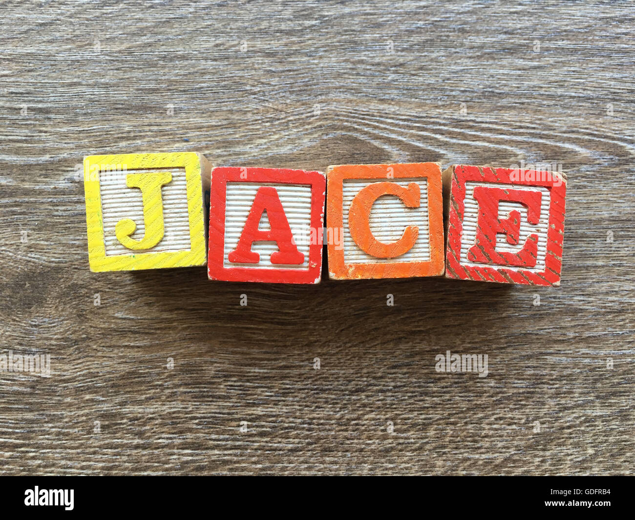 Jace name written with wood block letter toys Stock Photo
