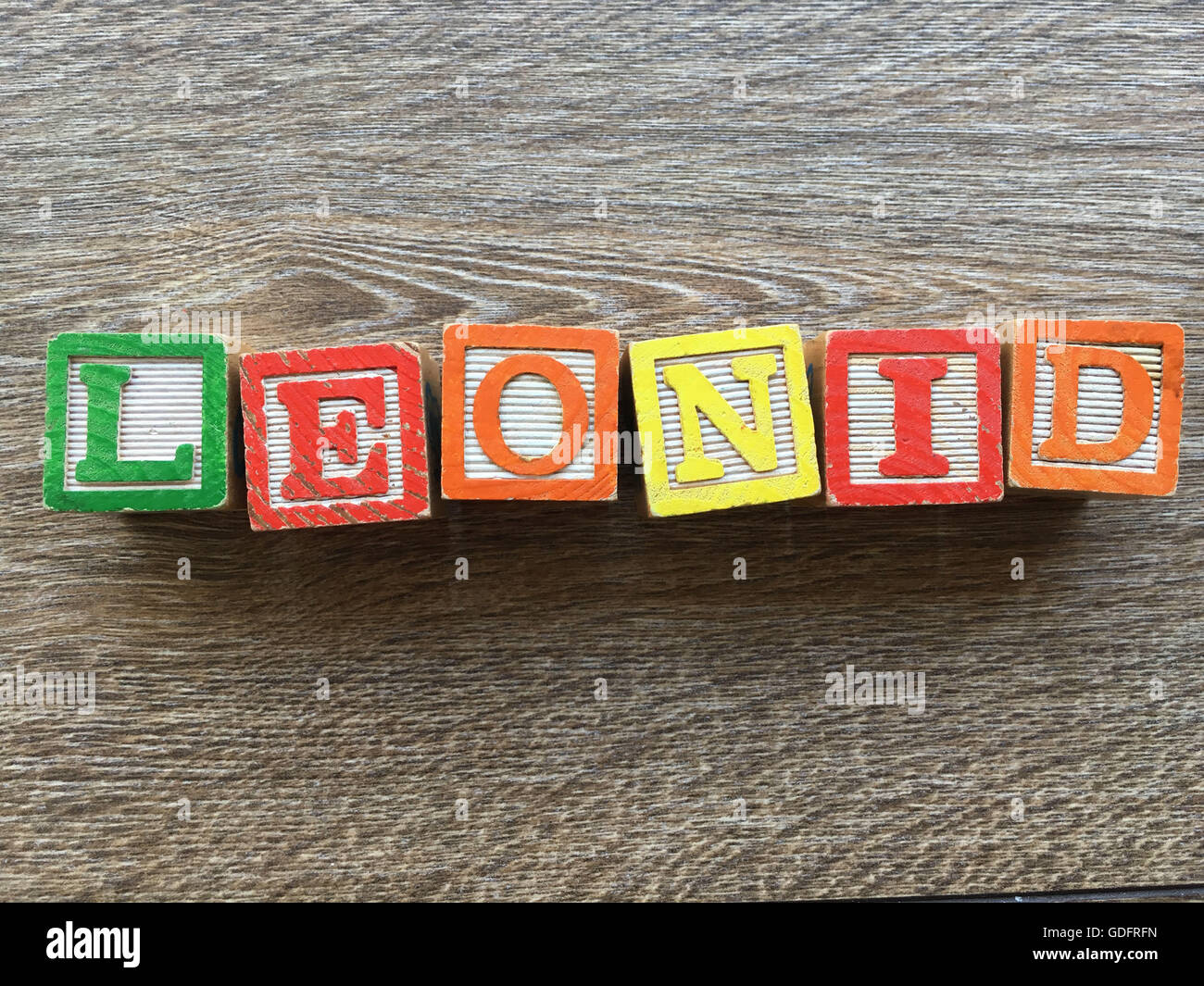 Leonid name written with wood block letter toys Stock Photo - Alamy