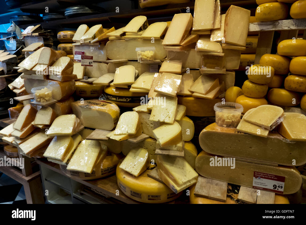 A large selection of dutch cheeses in a delicatessen in Amsterdam, Holland, Netherlands. Stock Photo