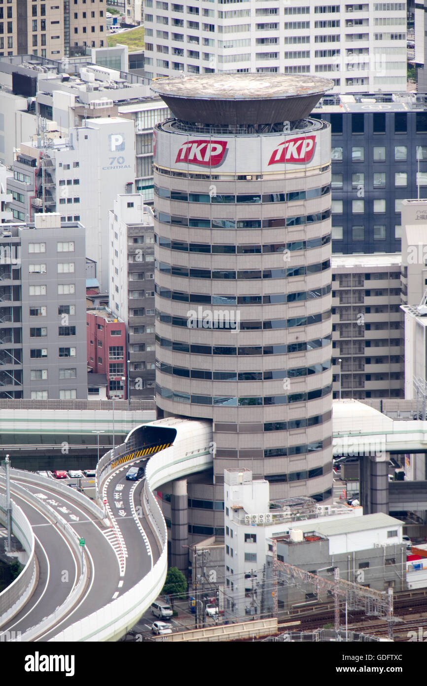 The Hanshin Expressway passing through the Gate Tower Building, Fukushima-ku, Osaka. Stock Photo