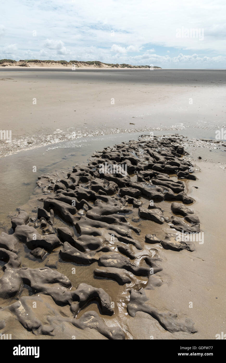 Mud bank on the beach at Formby point, Merseyside, northwest England. Stock Photo